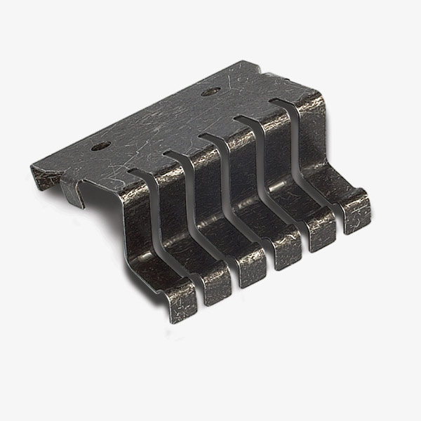 Clamping spring coated with bonded dry film lubricant coating for noise reduction.